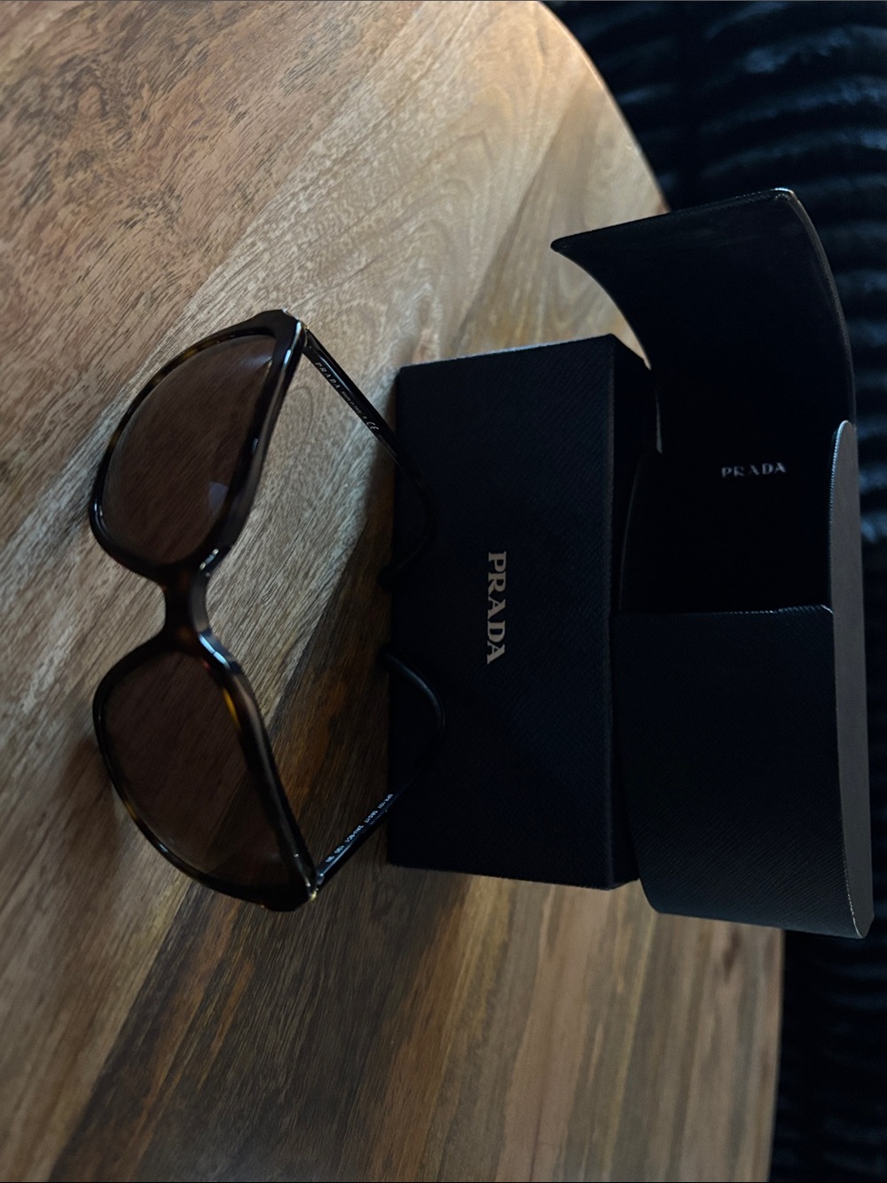 Prada Women’s Black Sunglasses with Dark Gradient Lenses